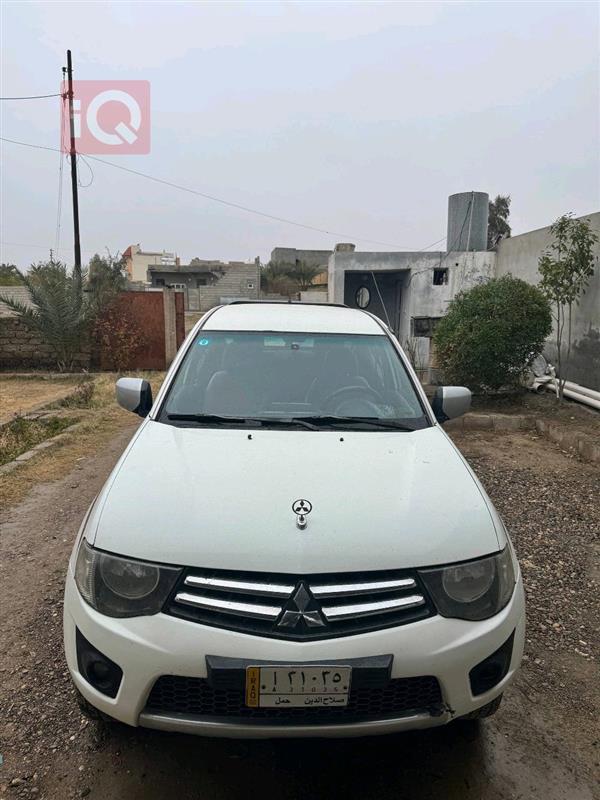 ميتسوبيشي L200 2011 للبيع في العراق - العلم